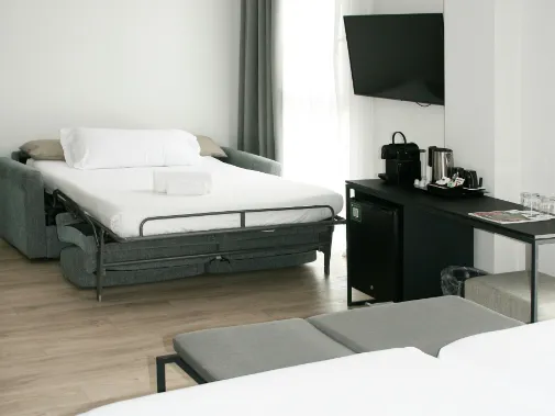 Habitaciones/Superior Triple con Camas individuales
